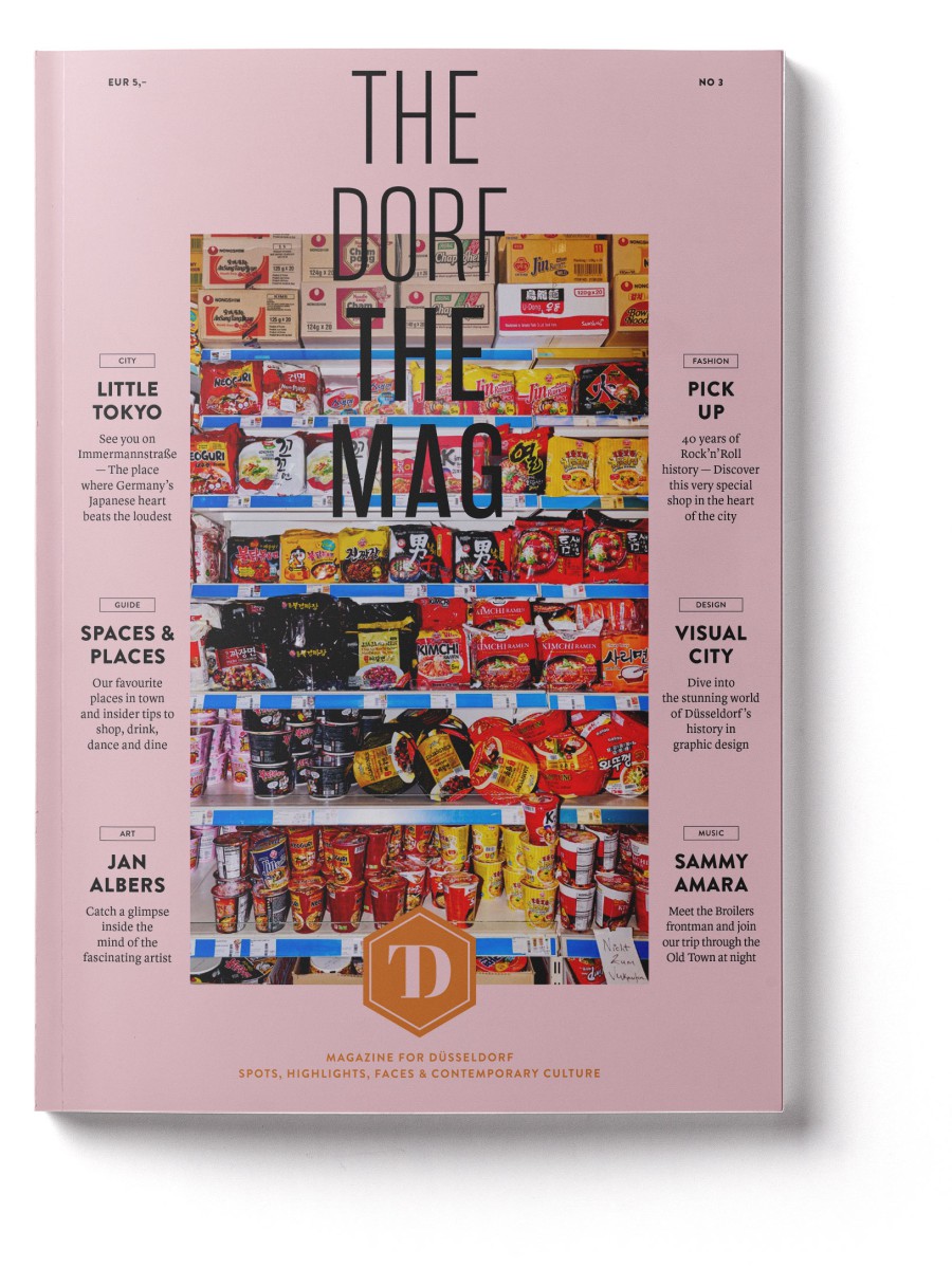 Cover of THE DORF THE MAG No. 3 from 2019, featuring a pink background and a photograph of an Asian ramen shelf
